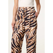Load image into Gallery viewer, Animal Print Wide Leg Trousers with Metallic Stripe Detail (close up)