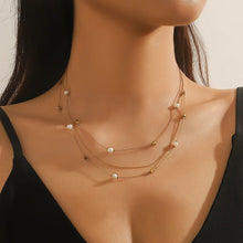 Load image into Gallery viewer, Delicate Gold & Pearl Triple Stainless Steel Chain Necklace (on model)