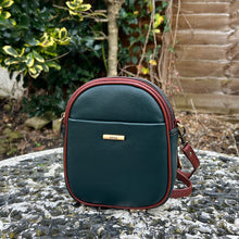 Load image into Gallery viewer, Dark Green &amp; Tan Leather &#39;Poppy&#39; Oval Shaped Twin Zip Top Crossbody Bag (front)
