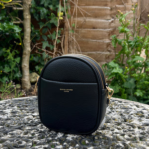 Black Oval Shaped Twin Zip Top Crossbody Bag By David Jones (front)