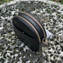 Load image into Gallery viewer, Black Oval Shaped Twin Zip Top Crossbody Bag By David Jones (top view)

