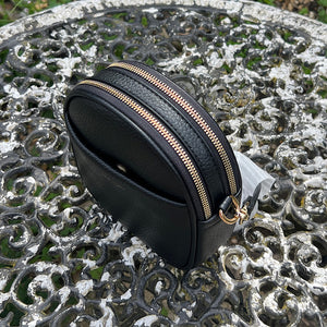 Black Oval Shaped Twin Zip Top Crossbody Bag By David Jones (top view)