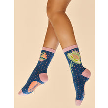 Load image into Gallery viewer, Navy Scandinavian Stems Bamboo Socks (on model)
