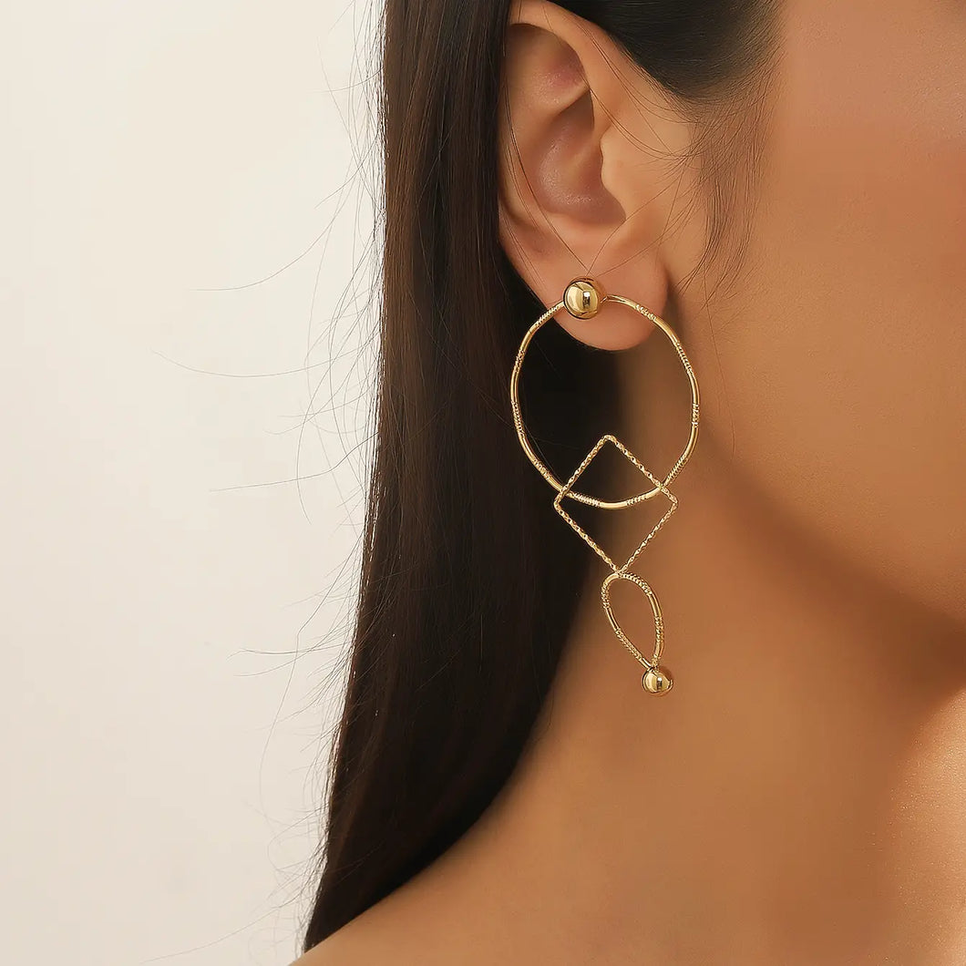 Gold Geometric Stainless Steel Stud Earrings (on model)