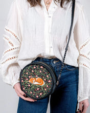 Load image into Gallery viewer, Fable Embroidered Sleeping Fox Round Velvet Crossbody Bag – Black (on model)
