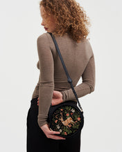 Load image into Gallery viewer, Fable Embroidered Woodland Stag Round Crossbody Bag – Black (on model)
