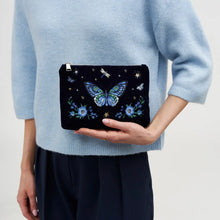 Load image into Gallery viewer, Fable England Enchanted Butterfly Embroidered Velvet Pouch – Navy (held)
