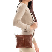 Load image into Gallery viewer, Tan Gianni Conti Slim Sectioned Italian Leather Crossbody Bag (on model)
